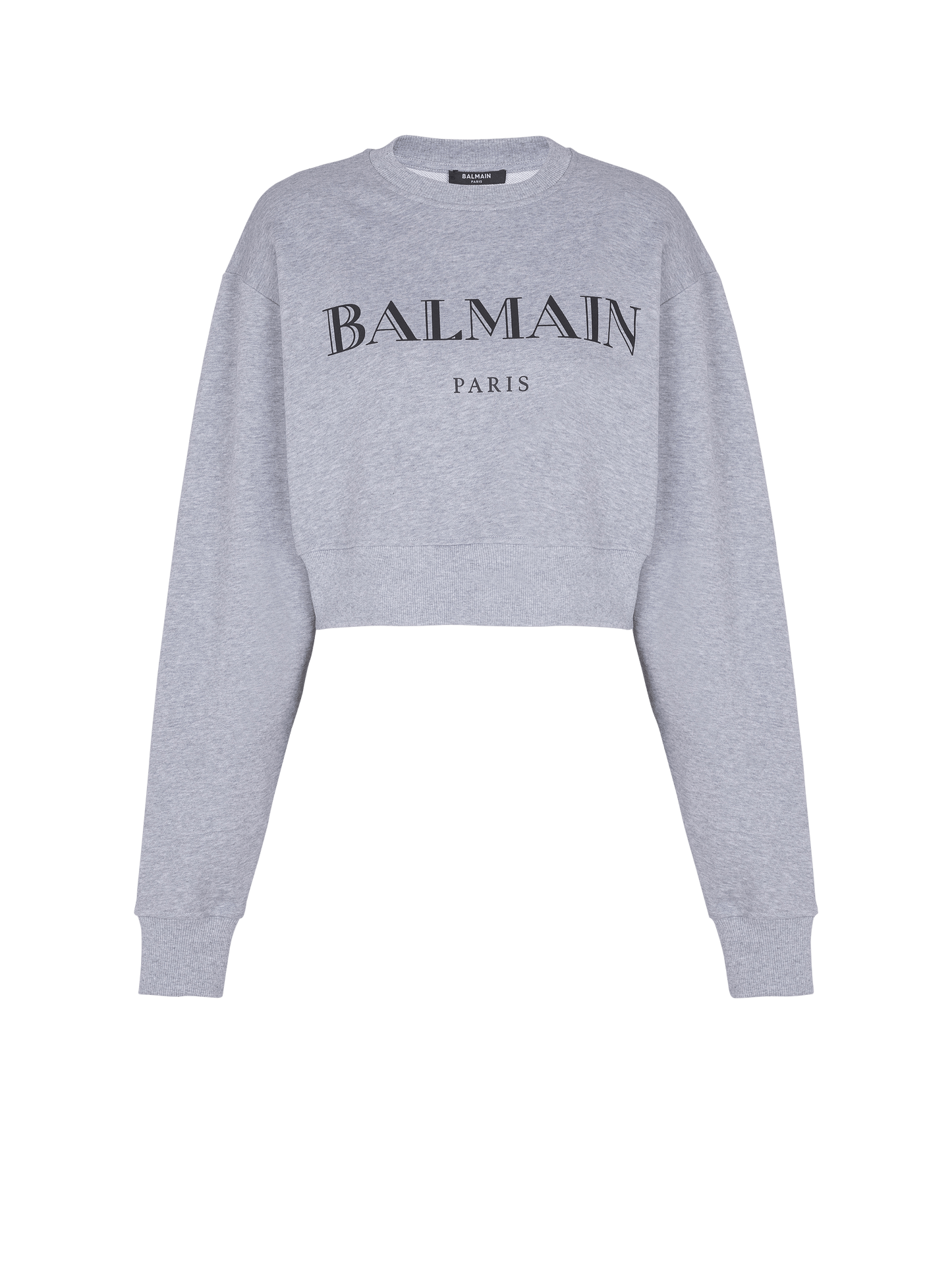 Gray Balmain sweatshirt on a green background